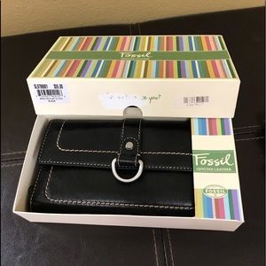 Authentic new in the box Fossil wallet.